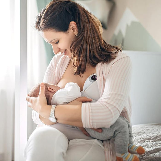 Irish mum breastfeeding her baby with support close by