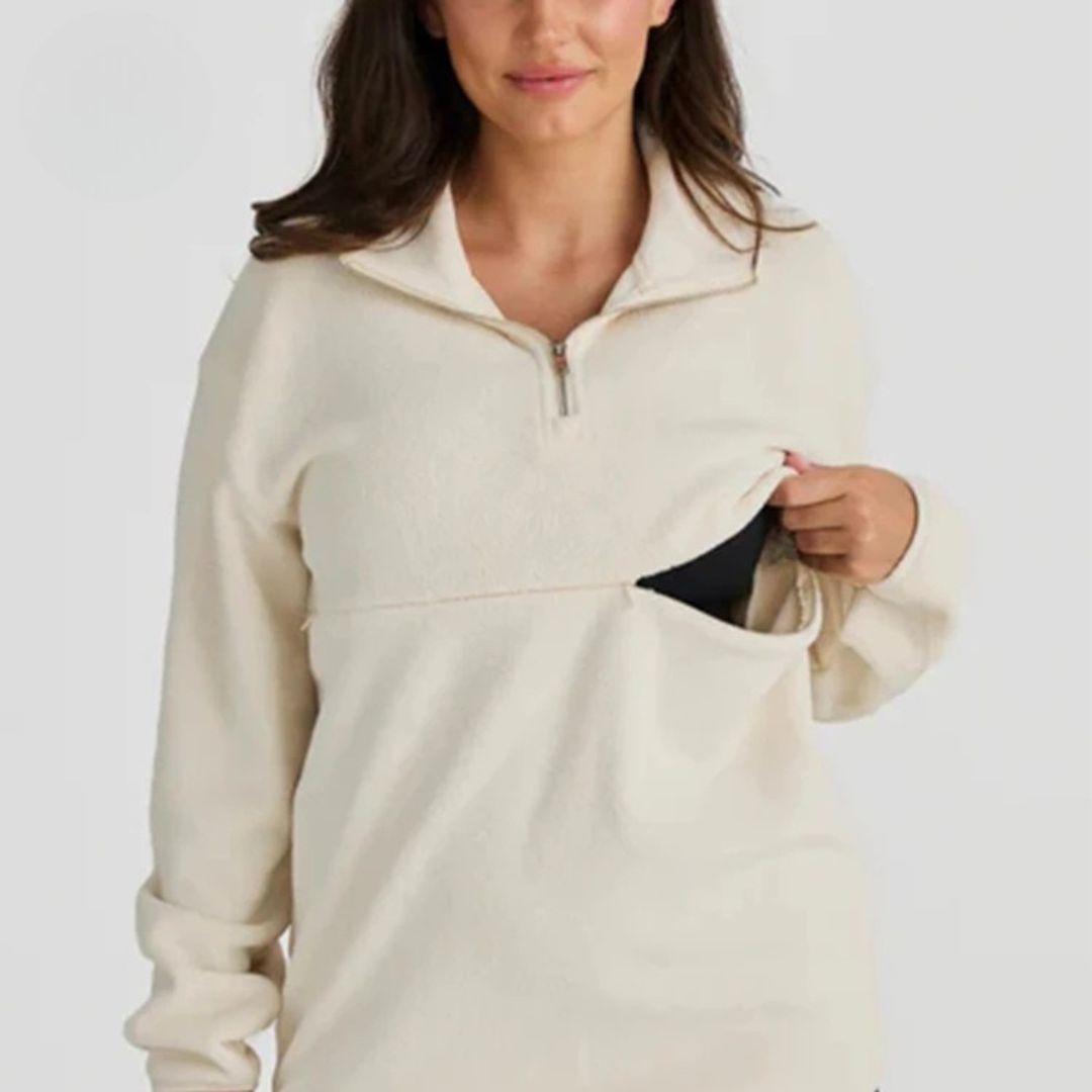Ivory nursing half-zip worn by a breastfeeding mum, cosy nursing top with zip feeding access – Relievoo
