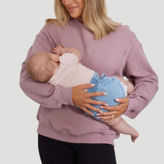 Dusty mauve nursing pullover worn by a breastfeeding mum with easy feeding access – Relievoo