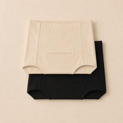 Twin pack of postpartum soothing briefs, one black and one ivory, folded and stacked