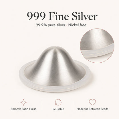 Close-up of a brushed 999 fine silver nursing cup showing its satin dome and clear silicone rim rvpumpen rvhasar