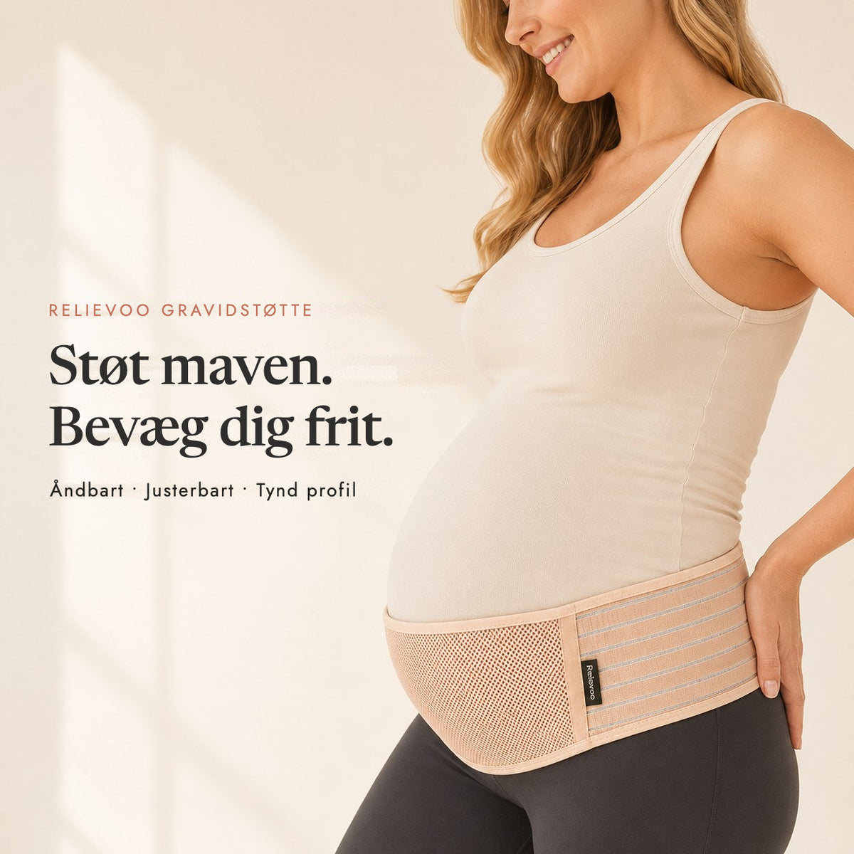 Pregnant woman wearing the tan Relievoo pregnancy support belt under her bump, breathable adjustable low-profile rvpumpen rvhasar