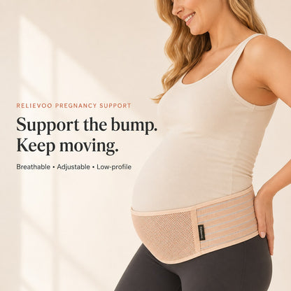 Pregnant woman wearing the tan Relievoo pregnancy support belt under her bump, breathable adjustable low-profile rvpumpen rvhasar