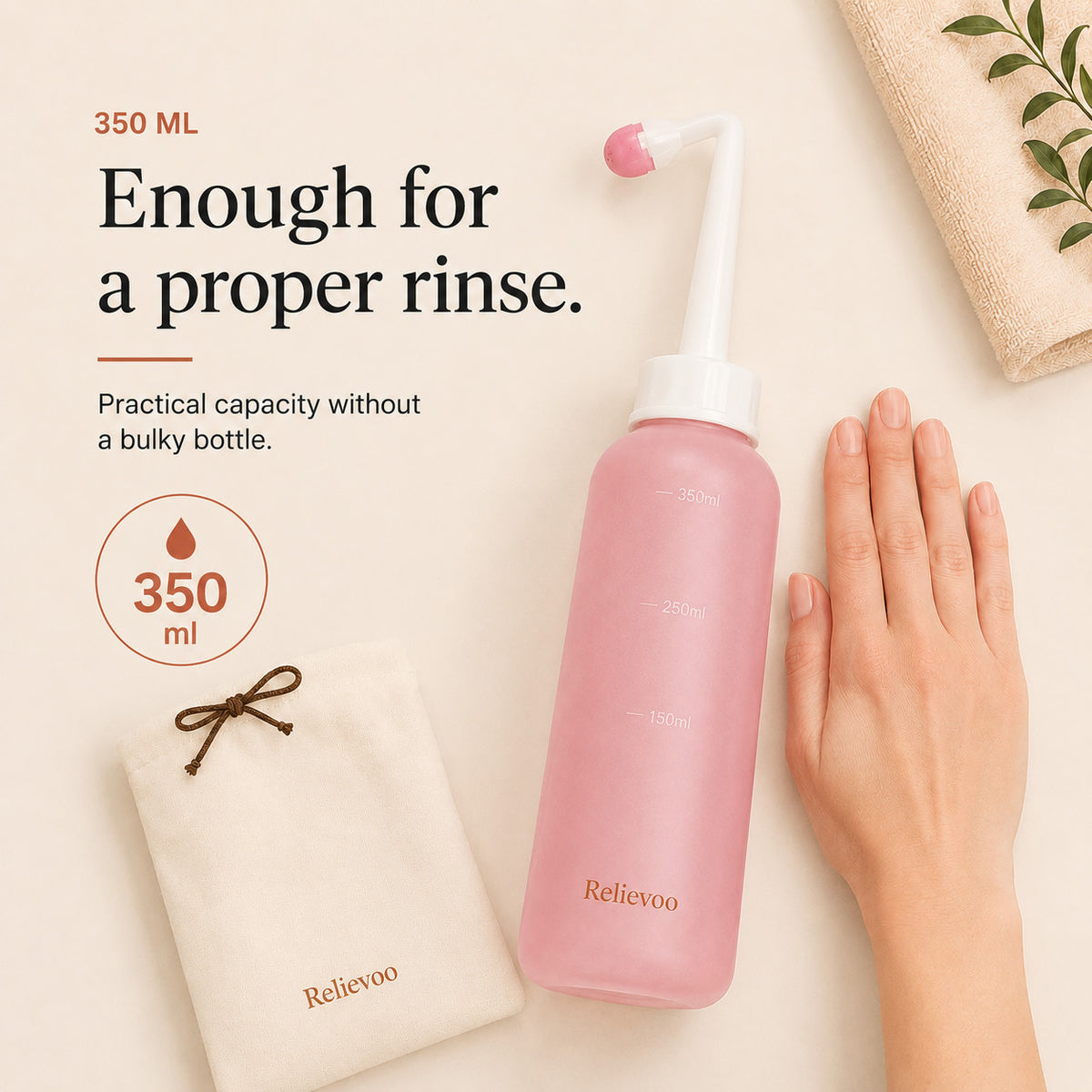 Relievoo peri bottle beside its folded travel pouch with a hand for scale, 350 ml rvpumpen rvhasar