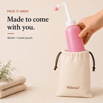 Relievoo peri bottle being placed into its cotton drawstring travel pouch beside folded towels rvpumpen rvhasar